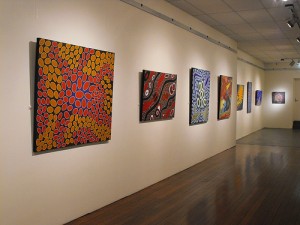 Paintings in the Ilgarijiri exhibition on display in Geraldton.