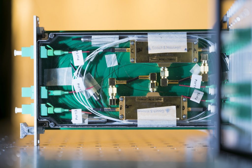 A prototype Transmitter Module shown partly extended from the front of a Sub-Rack enclosure, revealing details of the system’s critical fibre-optic components. Credit: ICRAR.