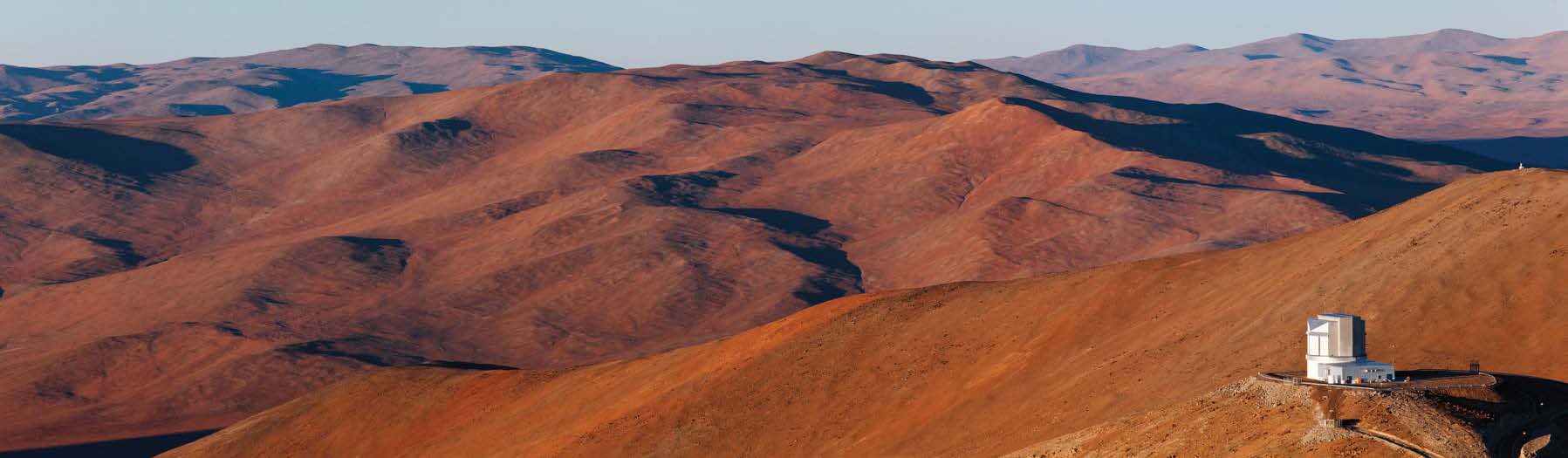 ESO’s Paranal Observatory—located in Chile’s Atacama region—with the VISTA enclosure visible in the lower right of the image. VISTA is the largest survey telescope in the world and it is dedicated to mapping the sky at near-infrared wavelengths. Credit: ESO/B. Tafreshi (twanight.org). 