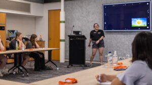 Angie presenting her pathway into astronomy at the ICRAR Stargirls STEM Camp