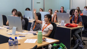 Participants learn how to code in a workshop run by the Data Institute.