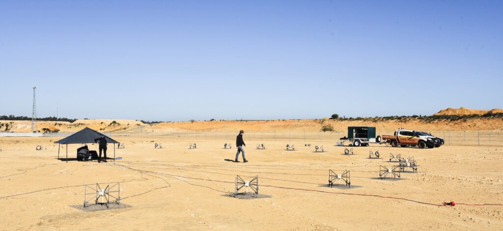 The Portable SDA system deployed at WA’s Australian Automation and Robotics Precinct (AARP) in Neerabup, WA with custom-fitted trailer in the background. Credit: M. Walker, ICRAR-Curtin. 