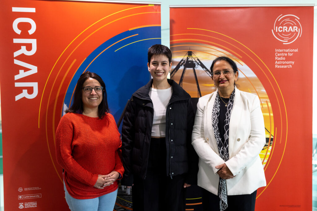 Laura Serrano Rodriguez (centre) with ICRAR’s Chief Operating Officer and Director of Translation and Impact, Dr Renu Sharma (right) and her research supervisor Dr Claudia Lagos (left)